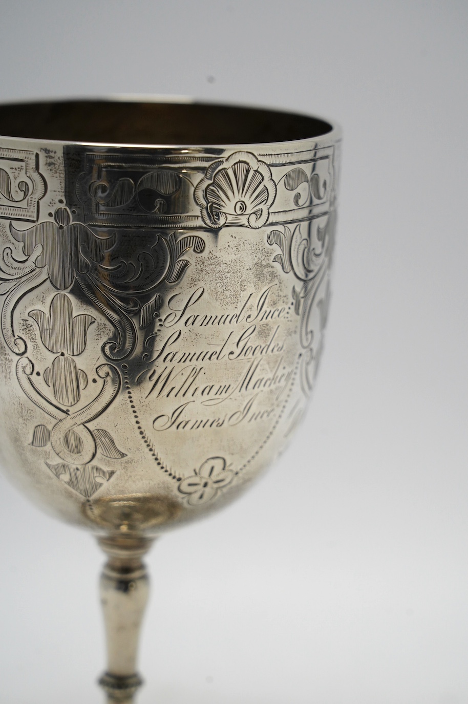 A Victorian engraved silver goblet, by Henry Holland, London, 1863, with engraved inscription, height 18.4cm, 7.9oz. Condition - fair